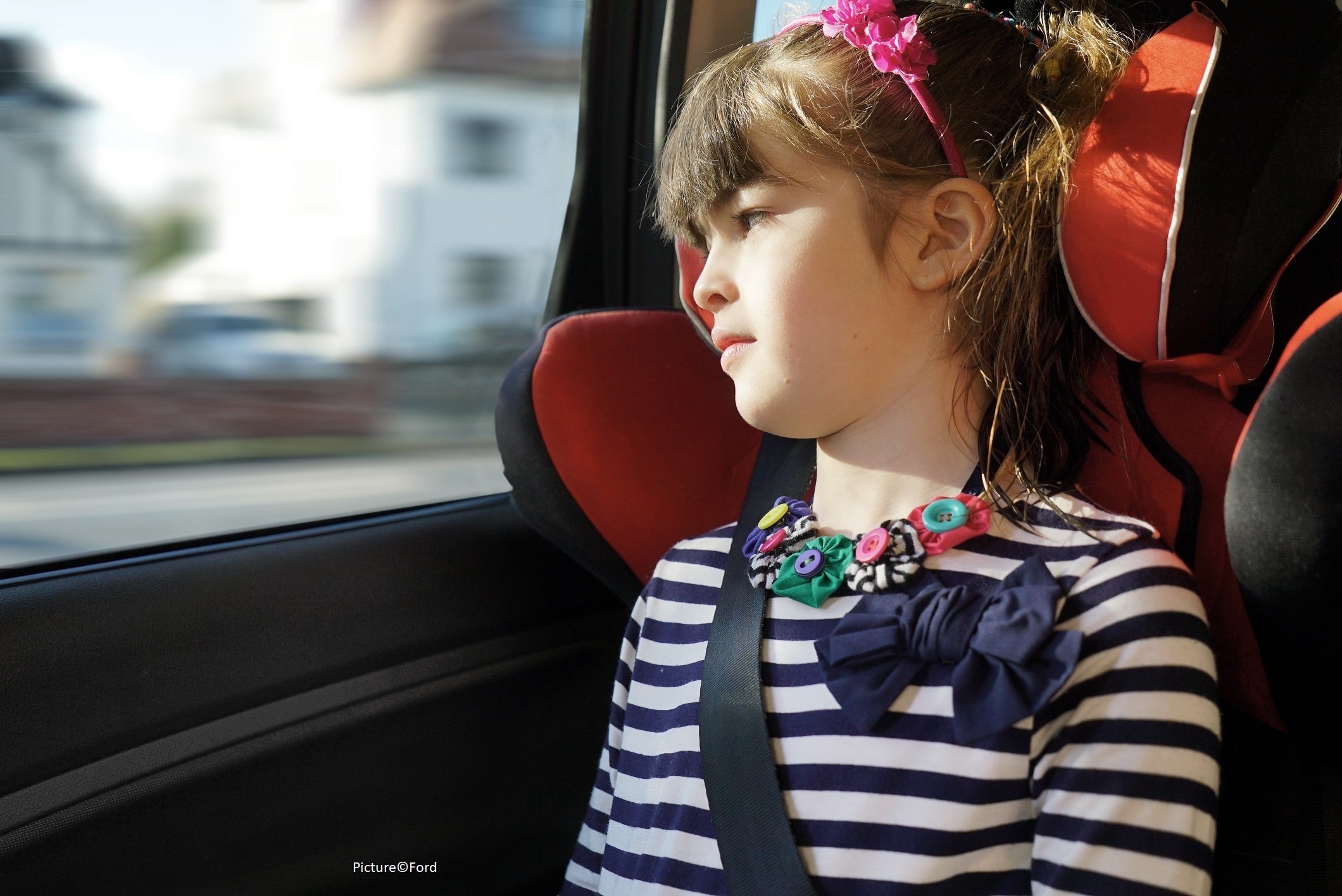 My daughter suffers from motion sickness in cars. What can I do about it?